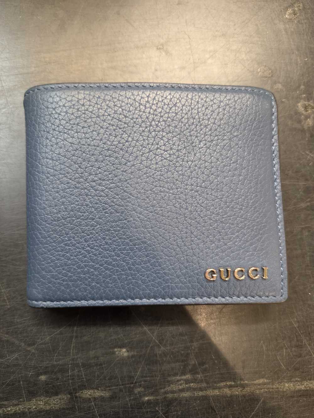 Gucci Blue Pebbled Leather Bi-Fold Wallet with Gold Logo